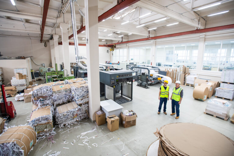 Workers of paper recycling factory